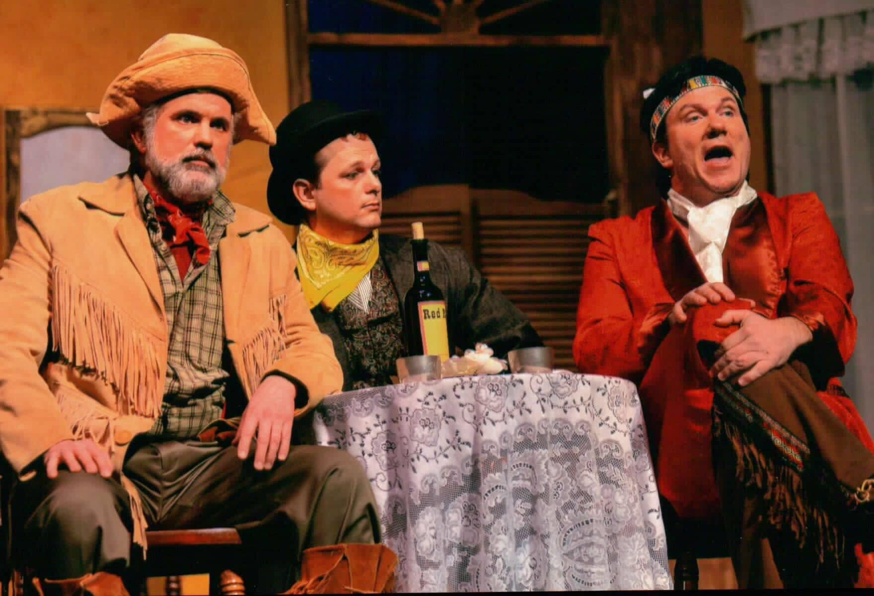 Kevin on stage performing in the play, Thataway Jack. Pictured, left to right:  Bob Augustin, Chad Franklin and Kevin.